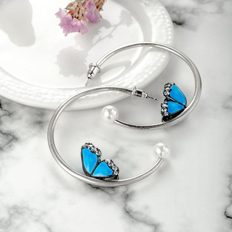 Butterfly Wing Adorned In Blue Lacquered  Earrings