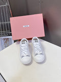 Miu Miu Distressed Retro Double Lace Sneakers
