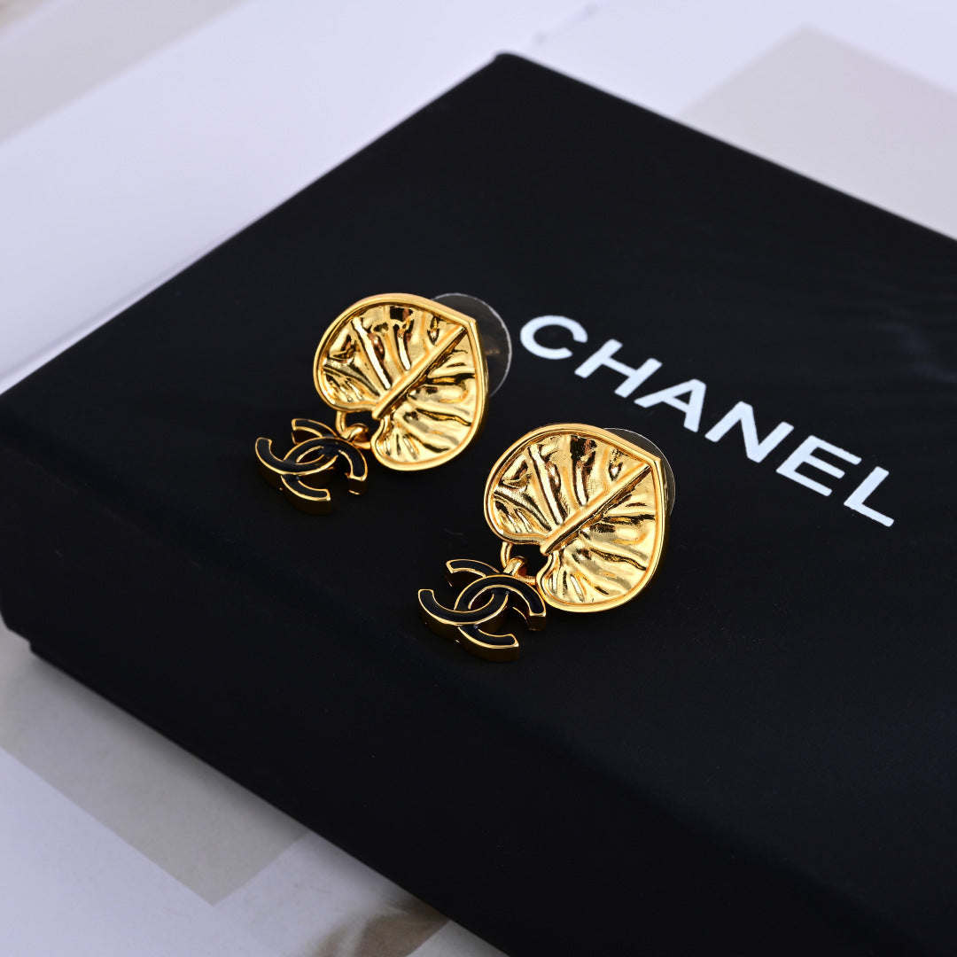 Chanel Elegant Sculpted Stud Earrings