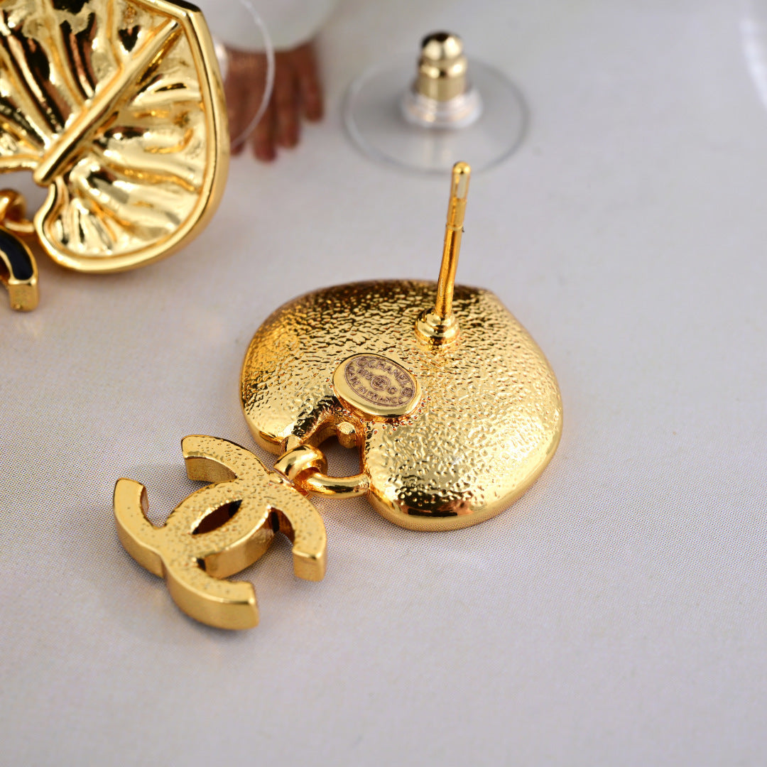 Chanel Elegant Sculpted Stud Earrings