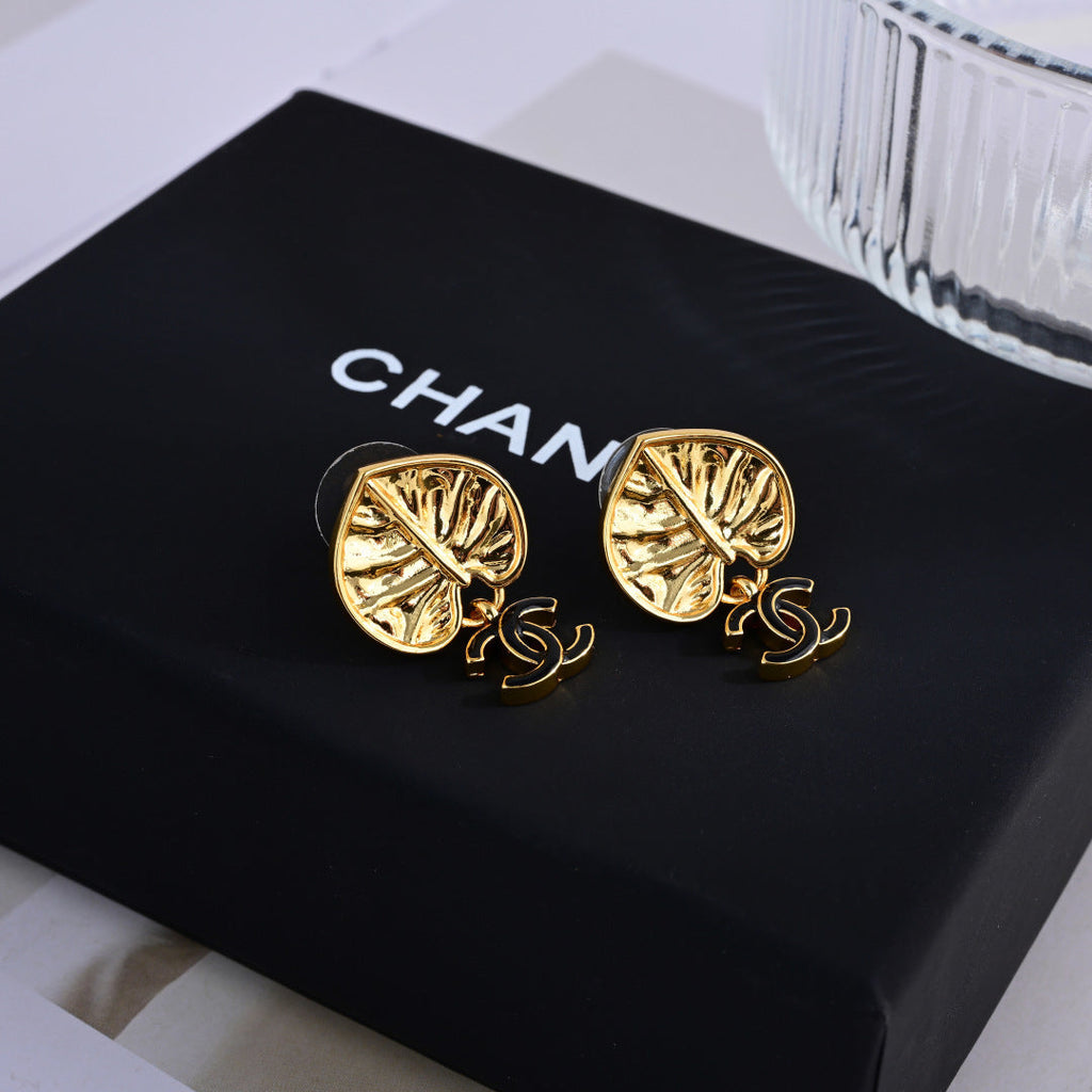 Chanel Elegant Sculpted Stud Earrings
