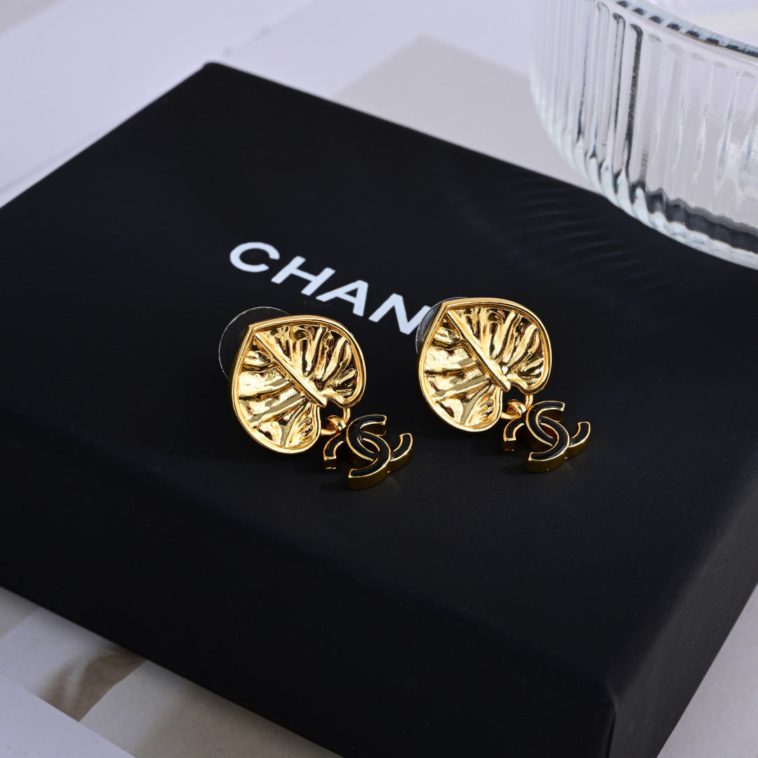 Chanel Elegant Sculpted Stud Earrings
