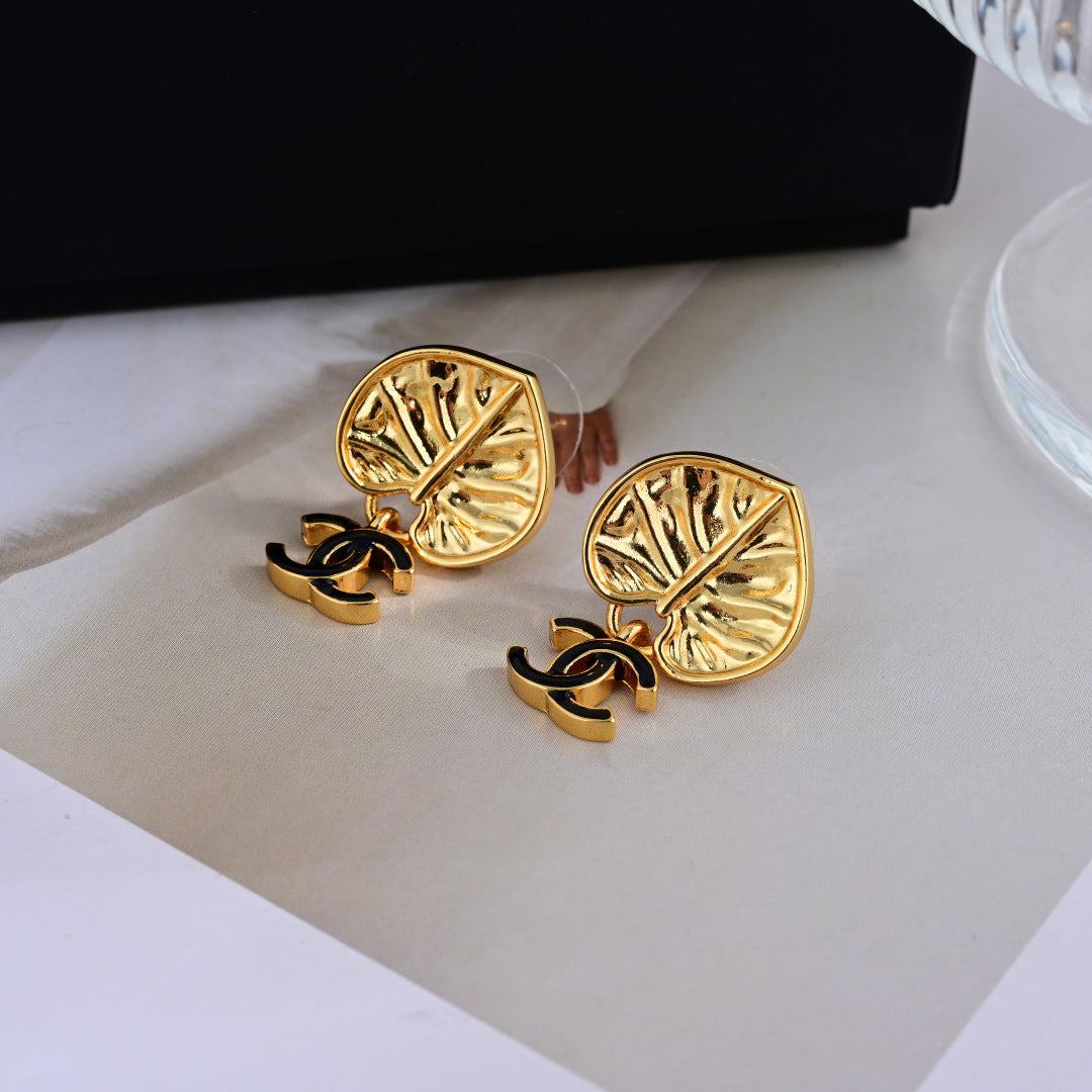 Chanel Elegant Sculpted Stud Earrings